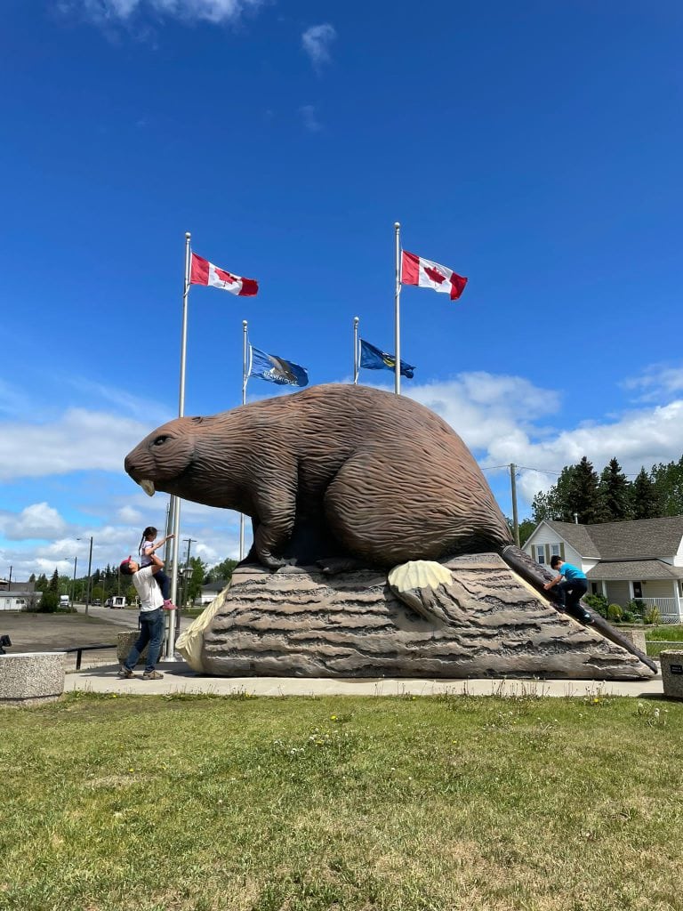 Kids checking out Beaverlodge, Alberta's Giant Beaver Statue