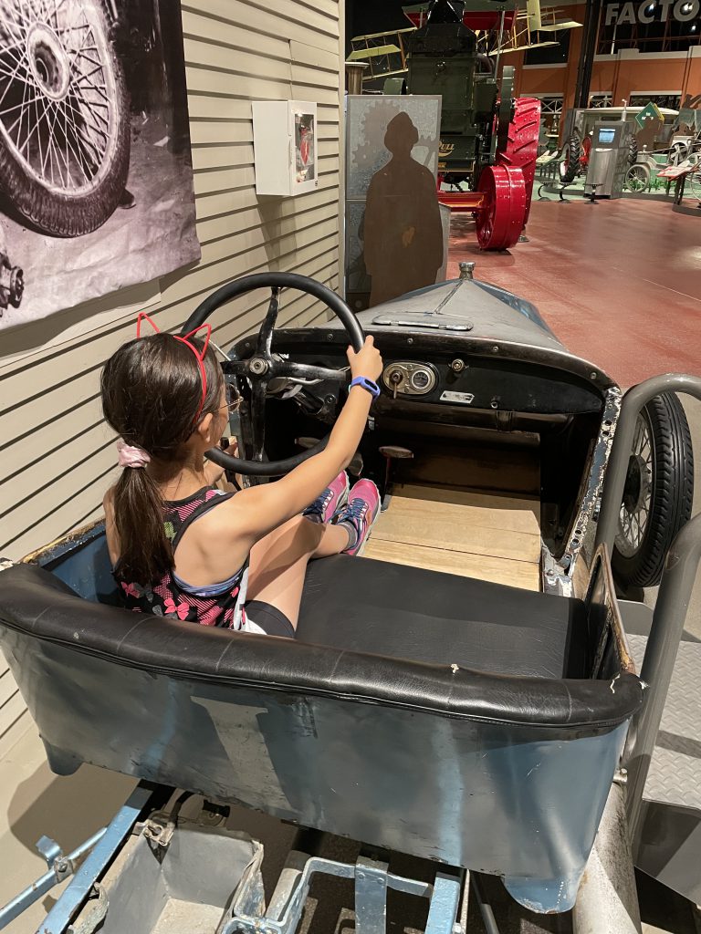 Driving a classic car at Reynolds-Alberta Museum