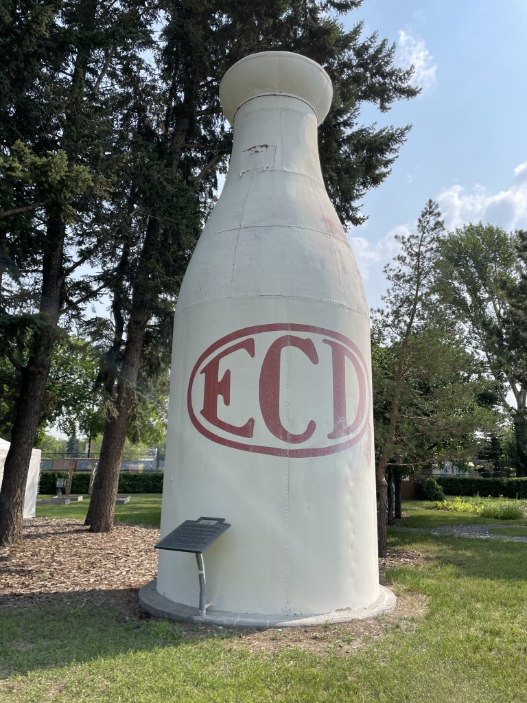 Huge White Milk bottle with red ECD logo
