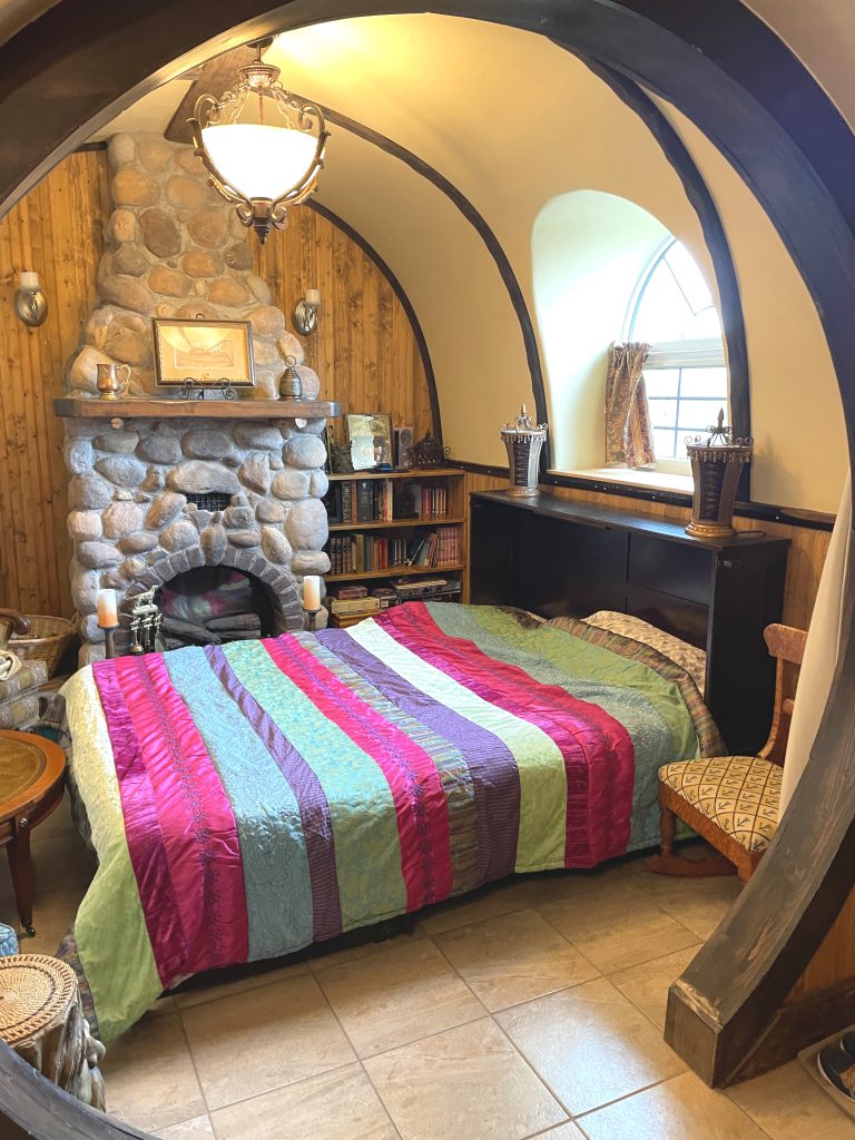 The Burrow living room with the queen bed folded out.
